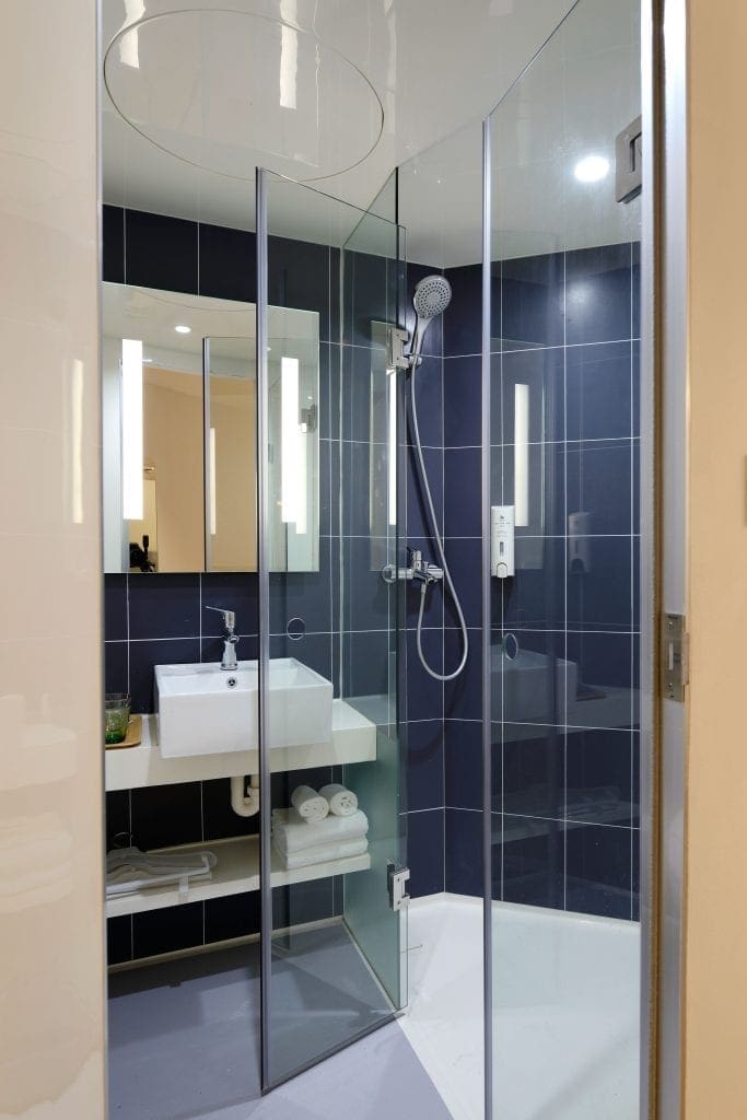 How to Clean Glass Shower Doors - The Maids